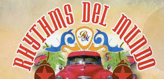Rhythms del Mundo, klasik bir grup yapısından farklı olarak çeşitli müzisyenlerin, vokalistlerin ve konuk sanatçıların bir araya geldiği kolektif bir yapı sunar. Özellikle 2000’li yıllarda yayımladığı albümlerle büyük ilgi gören proje, Latin müziği sevenler kadar pop ve rock dinleyicileri tarafından da keşfedilmiştir.
