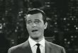 Robert Goulet, 20. yüzyılın ortalarından itibaren özellikle Broadway sahnelerinde ve konser dünyasında tanınmış, güçlü bariton sesi ve sahne karizmasıyla dikkat çeken bir Kanadalı-Amerikalı şarkıcı ve oyuncudur. Müzikal tiyatronun altın çağında yükselen Goulet, hem sahne performansları hem de televizyon ve sinema projeleriyle geniş bir hayran kitlesine ulaşmıştır.