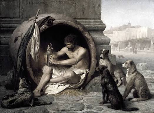Antik Yunan düşüncesi denildiğinde akla Platon, Aristoteles ve Sokrates gibi sistemli felsefi düşüncenin büyük isimleri gelir. Ancak bu dünyanın içinde, felsefeyi kitaplardan ve akademik tartışmalardan çıkarıp doğrudan günlük yaşamın içine taşıyan çok daha farklı bir figür de vardır: Sinoplu Diyojen.