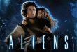 1986 yapımı Aliens, sinema tarihinin en önemli bilimkurgu ve aksiyon filmlerinden biri olarak kabul edilen, 1979 tarihli Alien filminin devamıdır. İlk filmde kurulan klostrofobik korku atmosferini tamamen terk etmeden, serinin dünyasını genişleten yapım; bu kez gerilimi daha büyük bir ölçekte ele alır. Yönetmen koltuğunda James Cameron bulunan film, bilimkurgu, aksiyon, korku ve macera türlerini aynı potada birleştirerek kendisinden sonra gelecek birçok filme de ilham veren bir yapı ortaya koyar.